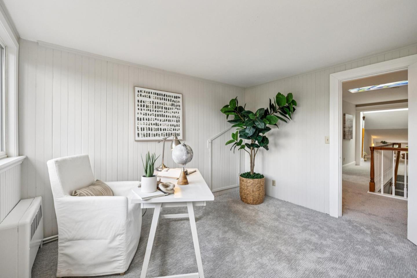 712 Crossway Road Burlingame, CA 94010 - Photo 72 of 90 a living room with furniture a potted plant and a potted plant