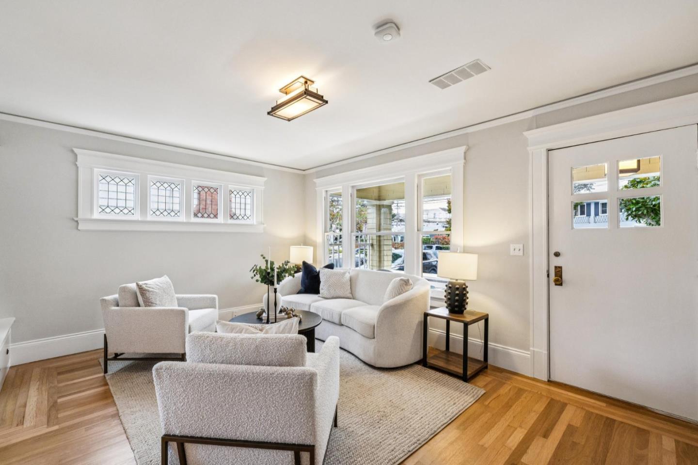 712 Crossway Road Burlingame, CA 94010 - Photo 10 of 90 a living room with furniture and a large window