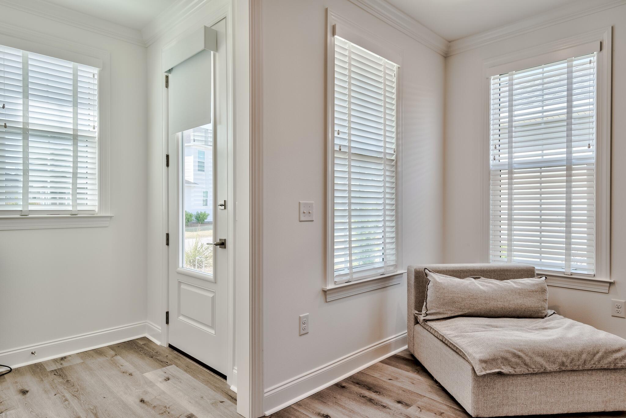 25 Cambium Court Watersound, FL 32461 - Photo 13 of 23 a living room with furniture and a window
