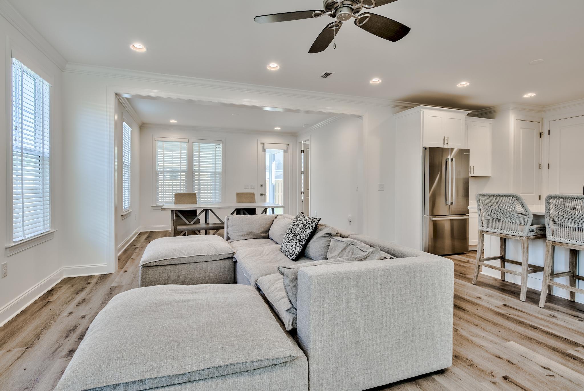 25 Cambium Court Watersound, FL 32461 - Photo 14 of 23 a living room with furniture and a ceiling fan