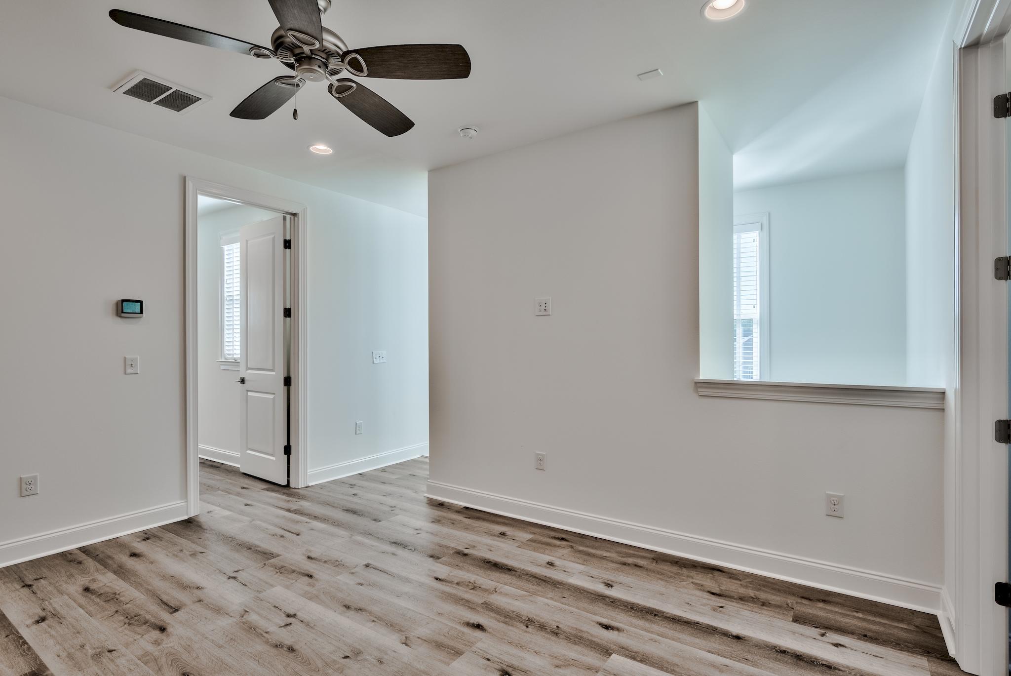 25 Cambium Court Watersound, FL 32461 - Photo 19 of 23 a view of an empty room and window