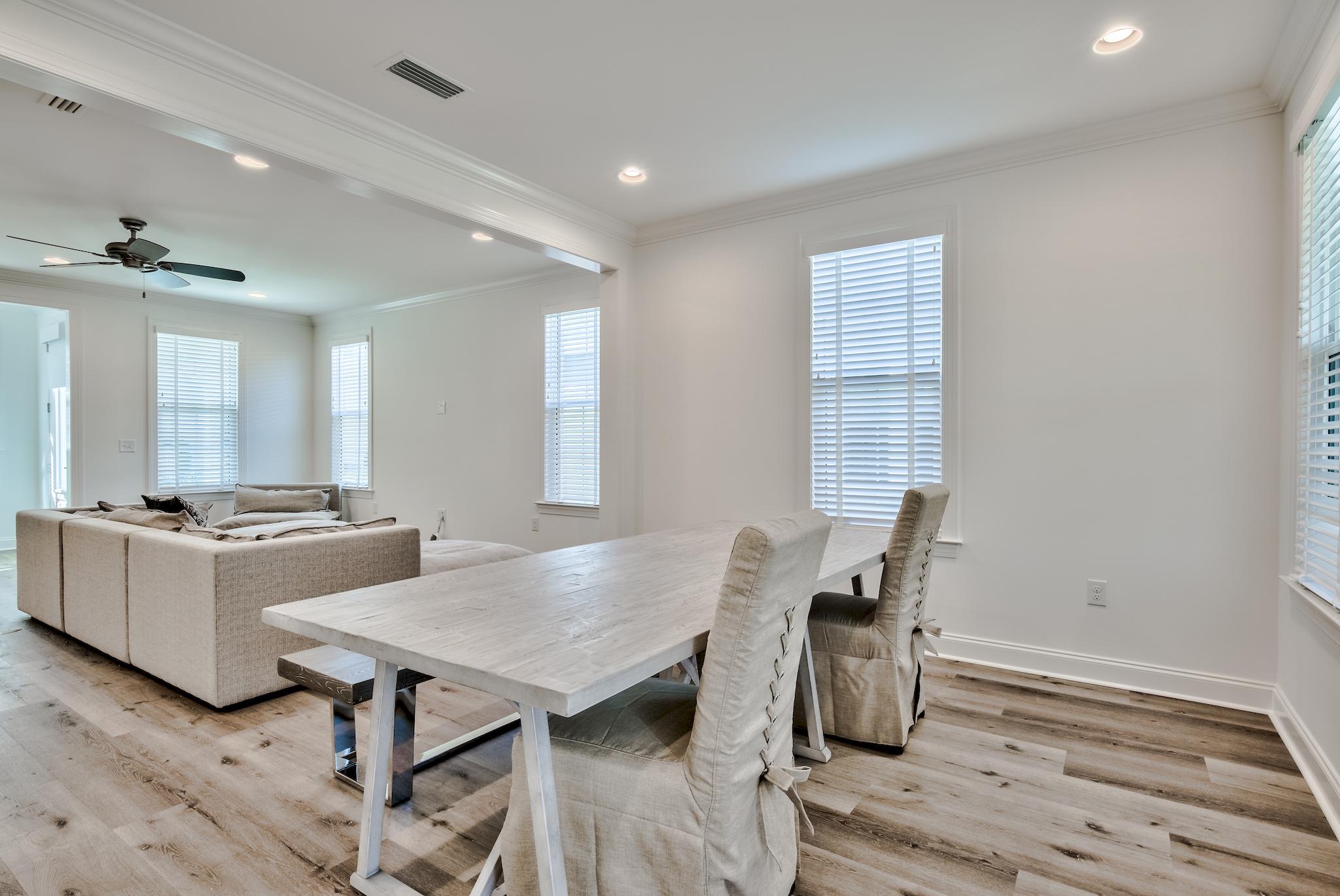 25 Cambium Court Watersound, FL 32461 - Photo 6 of 23 a living room with furniture and wooden floor