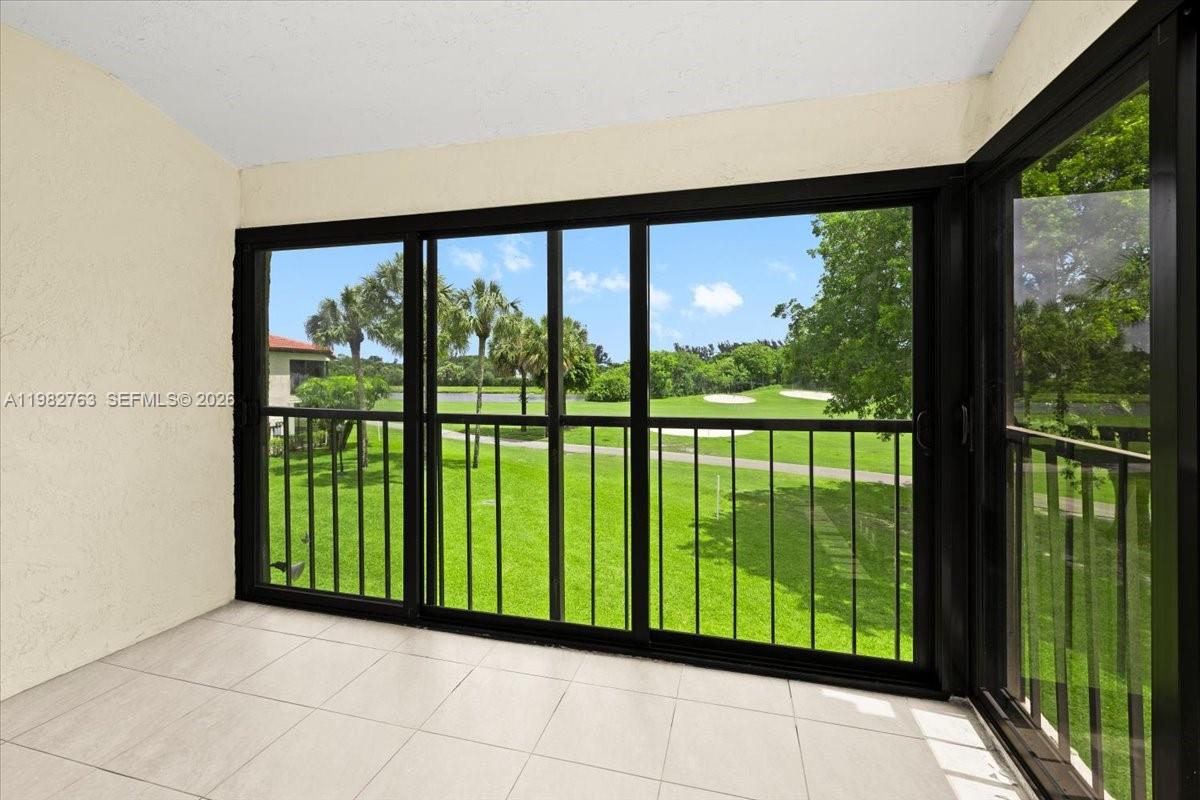 7944 Eastlake Drive, Unit D Boca Raton, FL 33433 - Photo 12 of 29 a view of a room with yard from a balcony