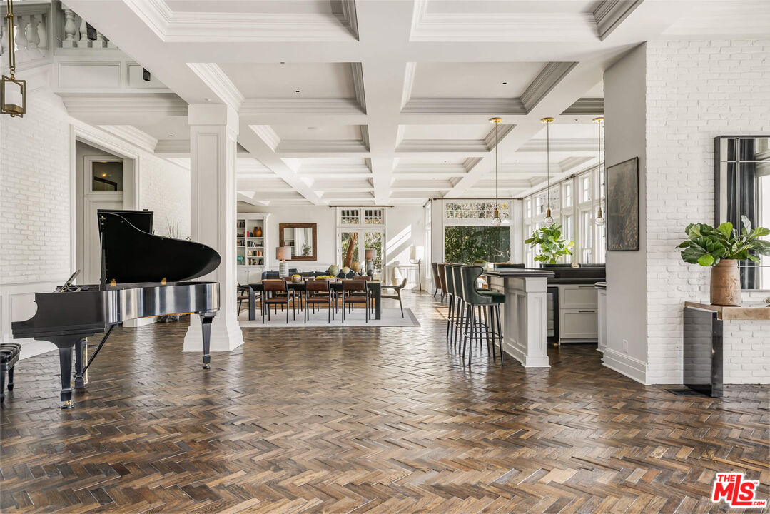9779 Oak Pass Road Beverly Hills, CA 90210 - Photo 2 of 43 a view of a living room kitchen and living room