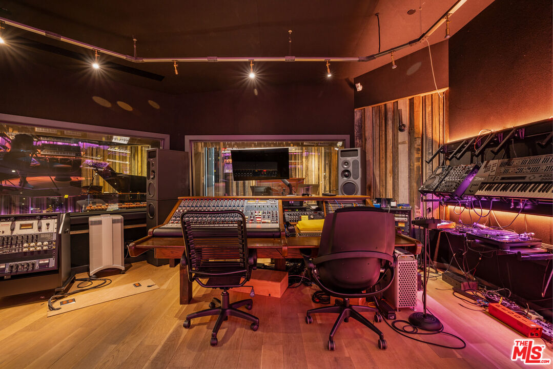 9779 Oak Pass Road Beverly Hills, CA 90210 - Photo 36 of 43 a view of a room with gym equipment