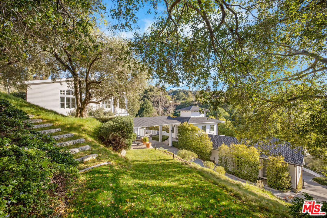 9779 Oak Pass Road Beverly Hills, CA 90210 - Photo 37 of 43 a view of yard with outdoor seating