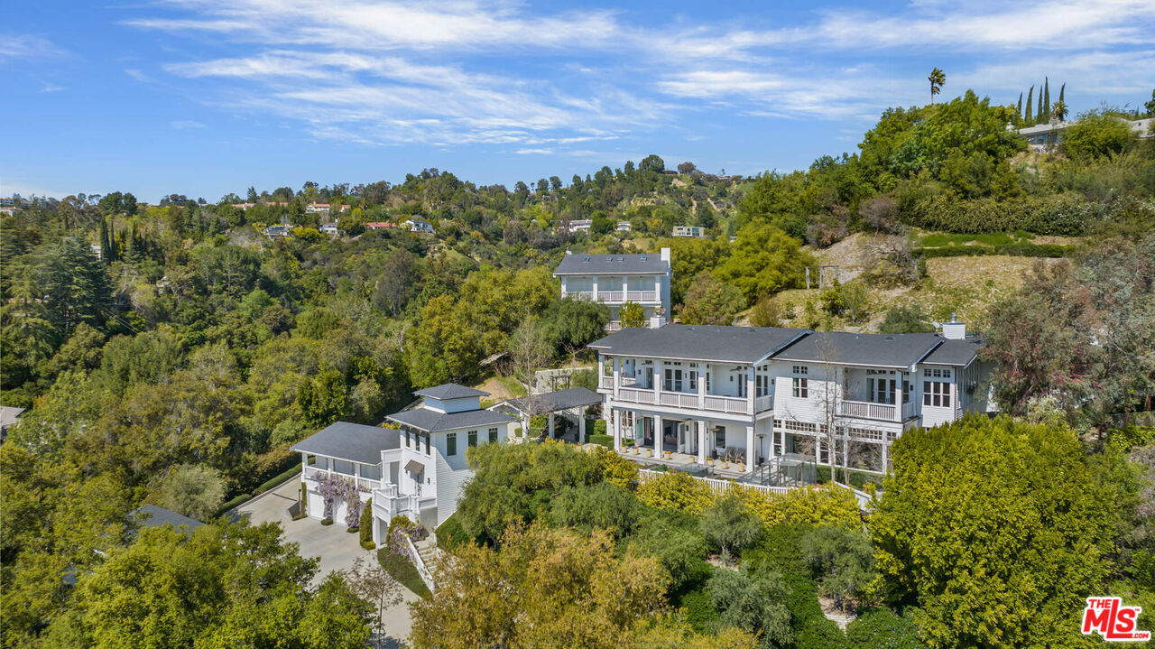 9779 Oak Pass Road Beverly Hills, CA 90210 - Photo 43 of 43 a view of a city with tall buildings