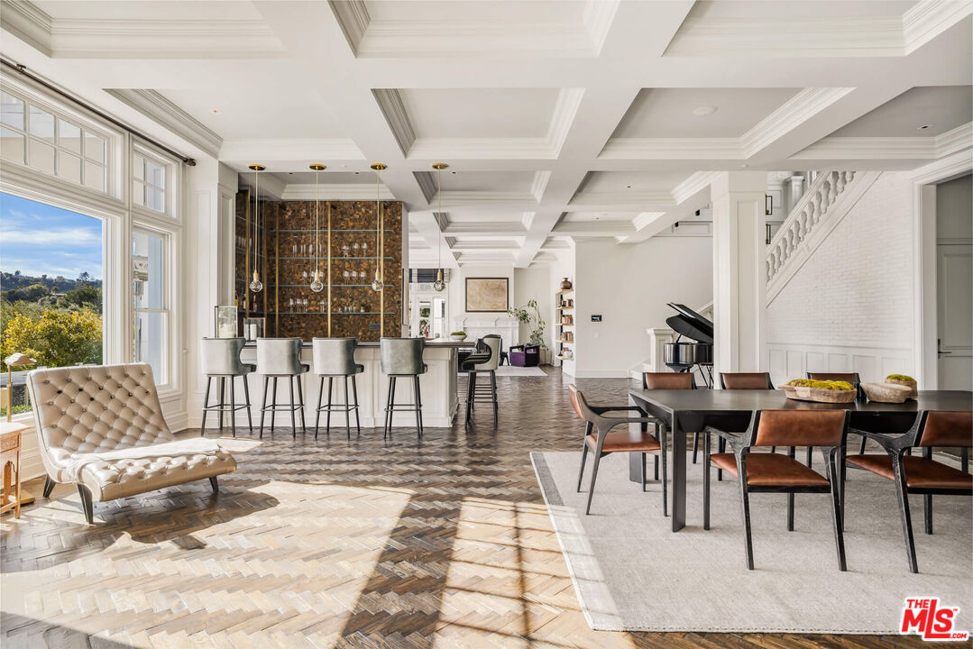9779 Oak Pass Road Beverly Hills, CA 90210 - Photo 7 of 43 a living room with furniture and a large window