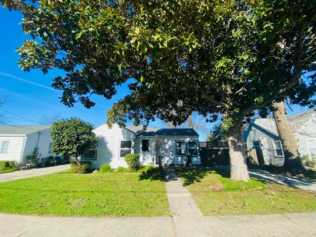a front view of a house with a porch
