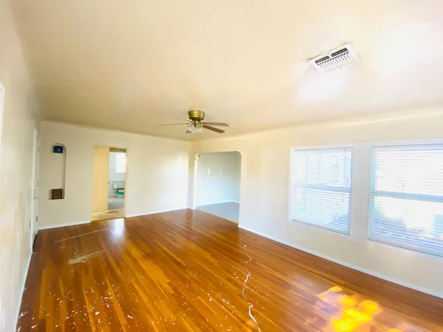 a view of an empty room and window