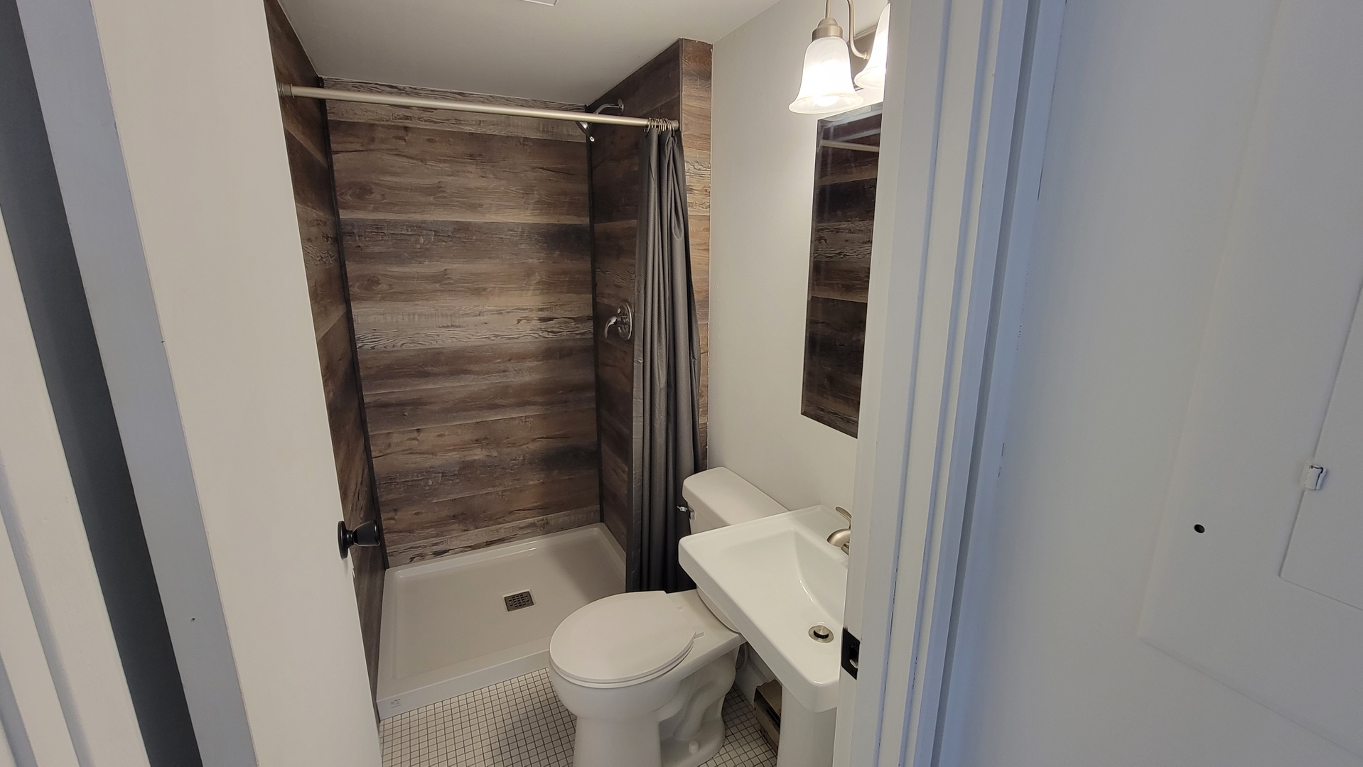 146 Center Street Seneca, IL 61360 - Photo 11 of 19 a bathroom with a shower and a toilet