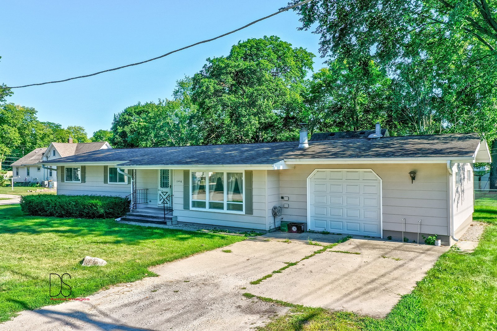 146 Center Street Seneca, IL 61360 - Photo 2 of 19 front view of a house with a yard