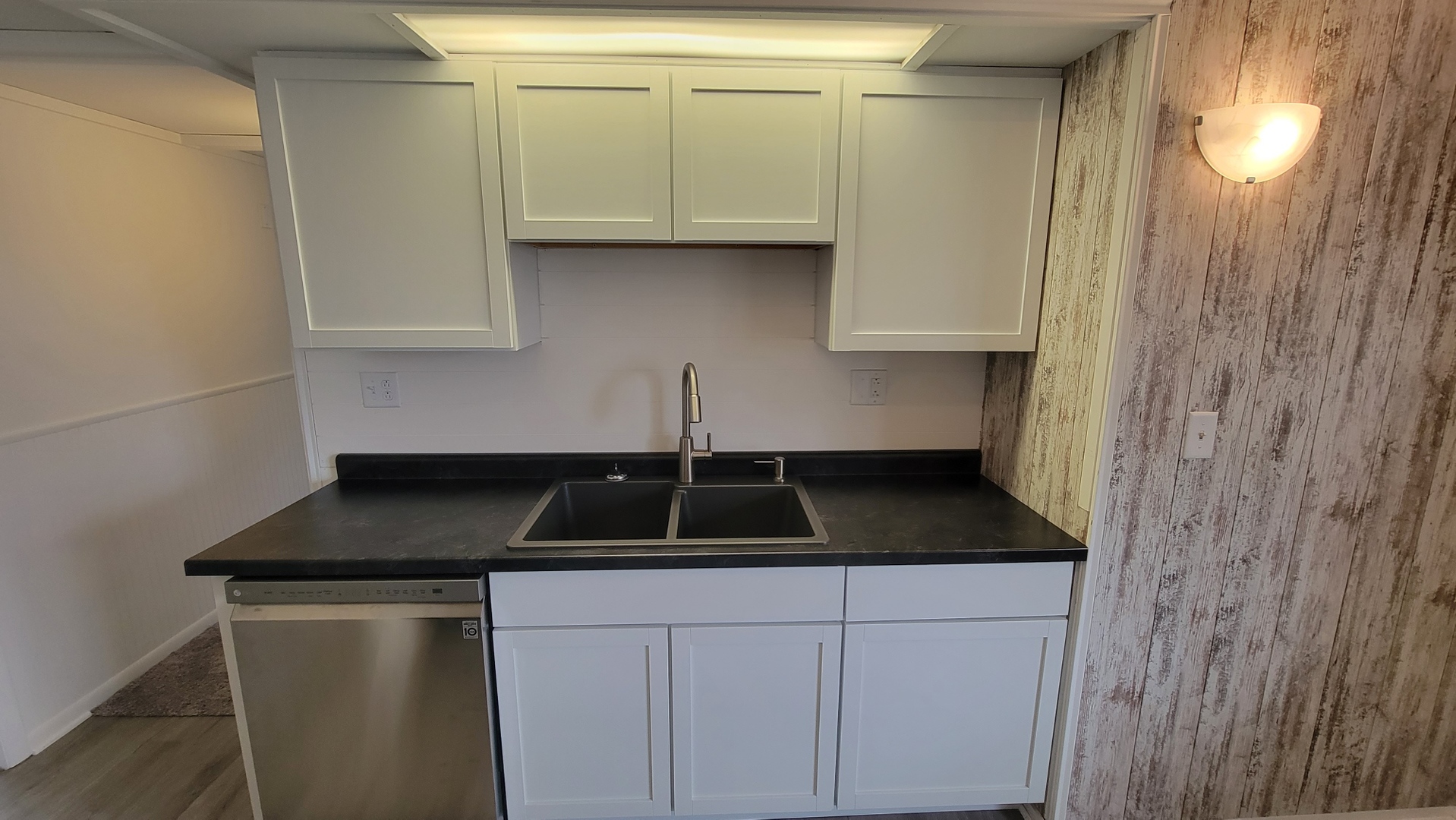 146 Center Street Seneca, IL 61360 - Photo 6 of 19 a kitchen with a sink and cabinets