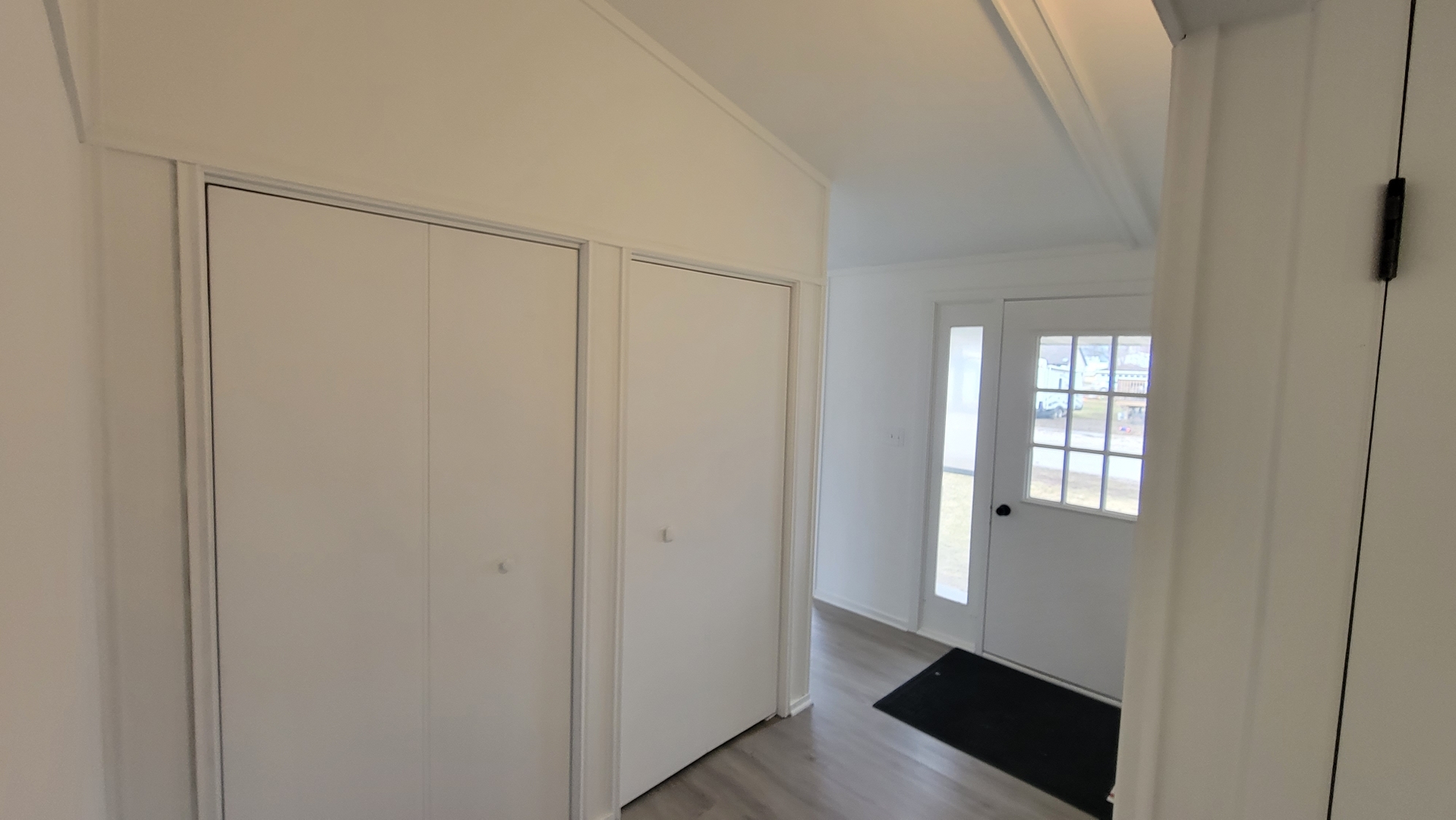 146 Center Street Seneca, IL 61360 - Photo 9 of 19 a view of an empty room with wooden floor and a window