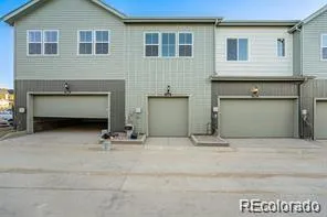 a view of house with outdoor space and windows