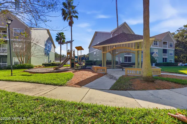 a front view of a building with garden