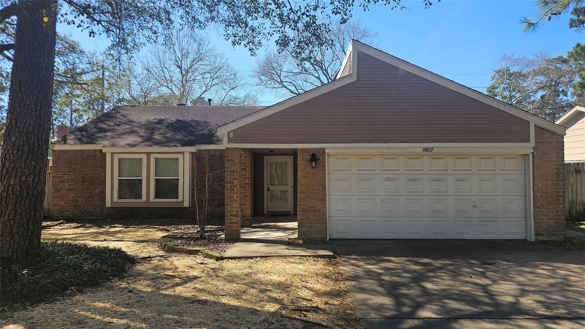 14807 Spring Lake Drive Houston, TX 77070 - Photo 1 of 21 a front view of a house