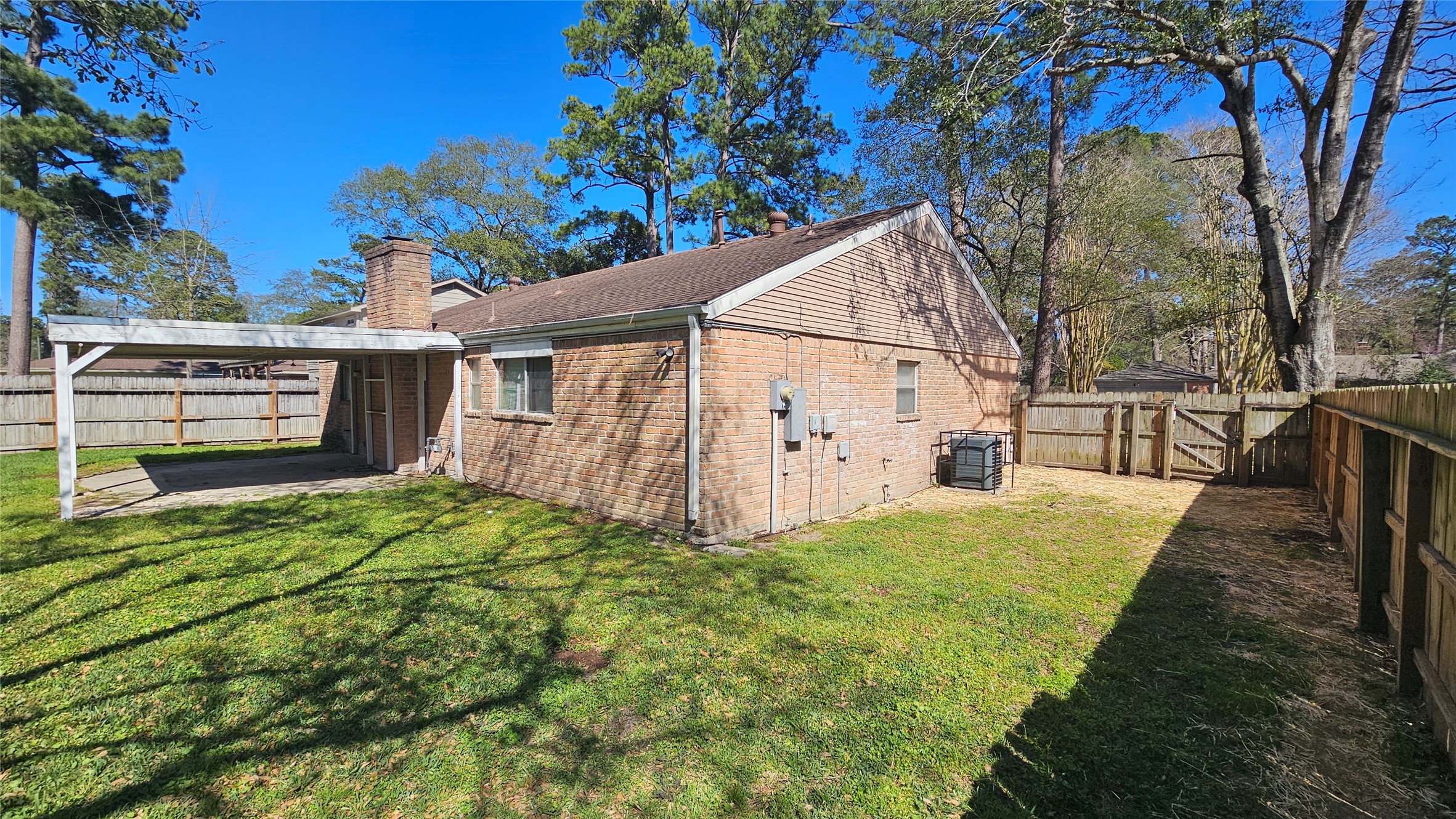 14807 Spring Lake Drive Houston, TX 77070 - Photo 20 of 21 a view of backyard of house