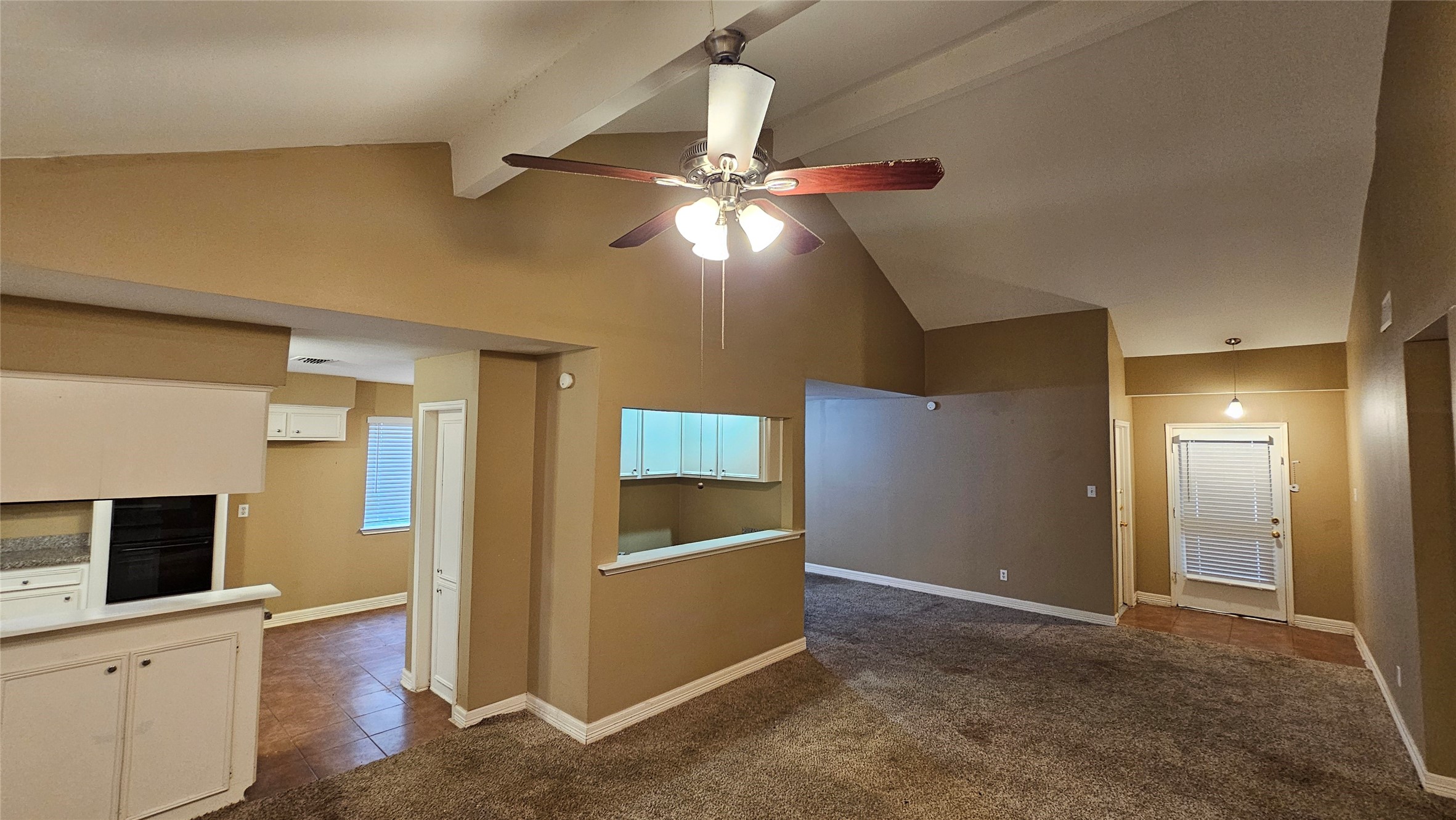 14807 Spring Lake Drive Houston, TX 77070 - Photo 5 of 21 a view of a livingroom with a kitchen