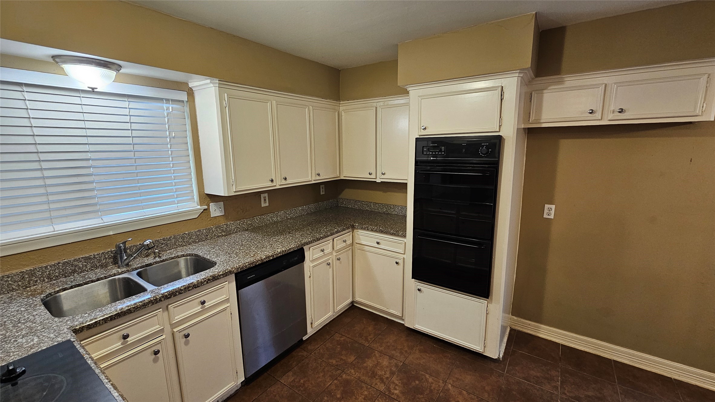 14807 Spring Lake Drive Houston, TX 77070 - Photo 8 of 21 a kitchen with stainless steel appliances granite countertop a stove and a refrigerator
