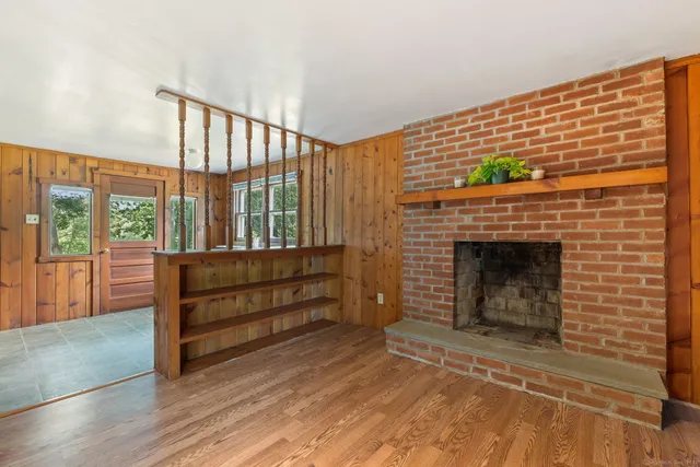 a view of outdoor space with deck and living room