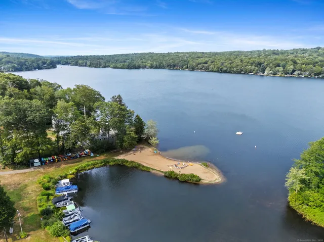a view of a yard with an outdoor seating