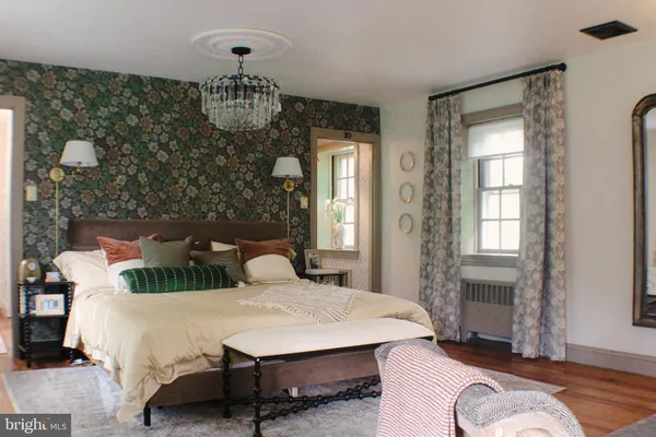 a front view of house with garden