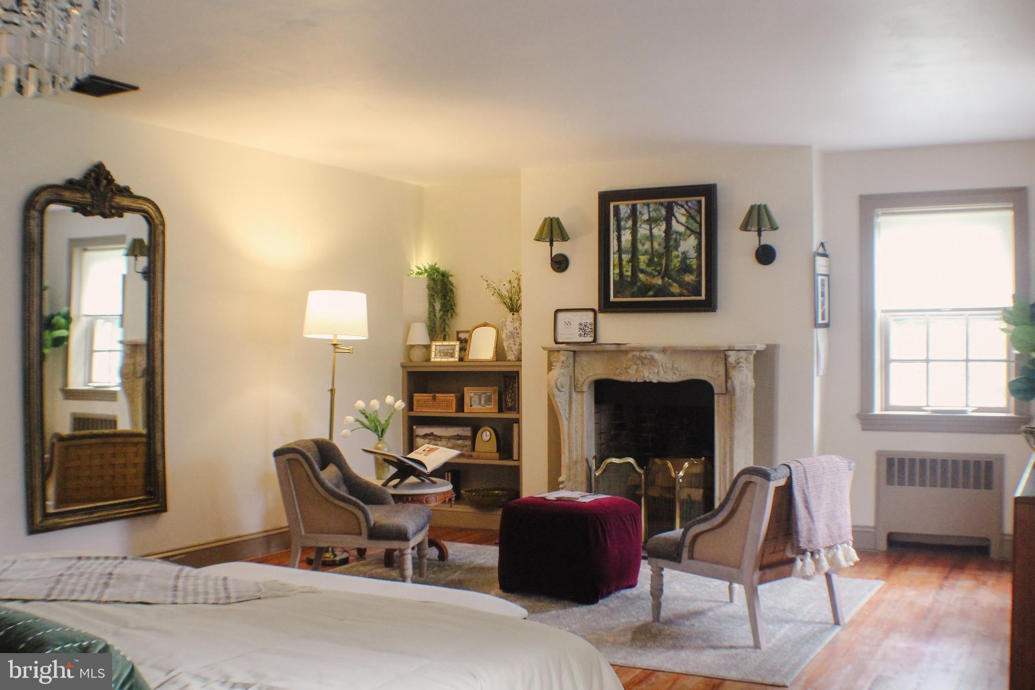 636 Almshouse Road Ivyland, PA 18974 - Photo 18 of 90 a living room with furniture and a fireplace