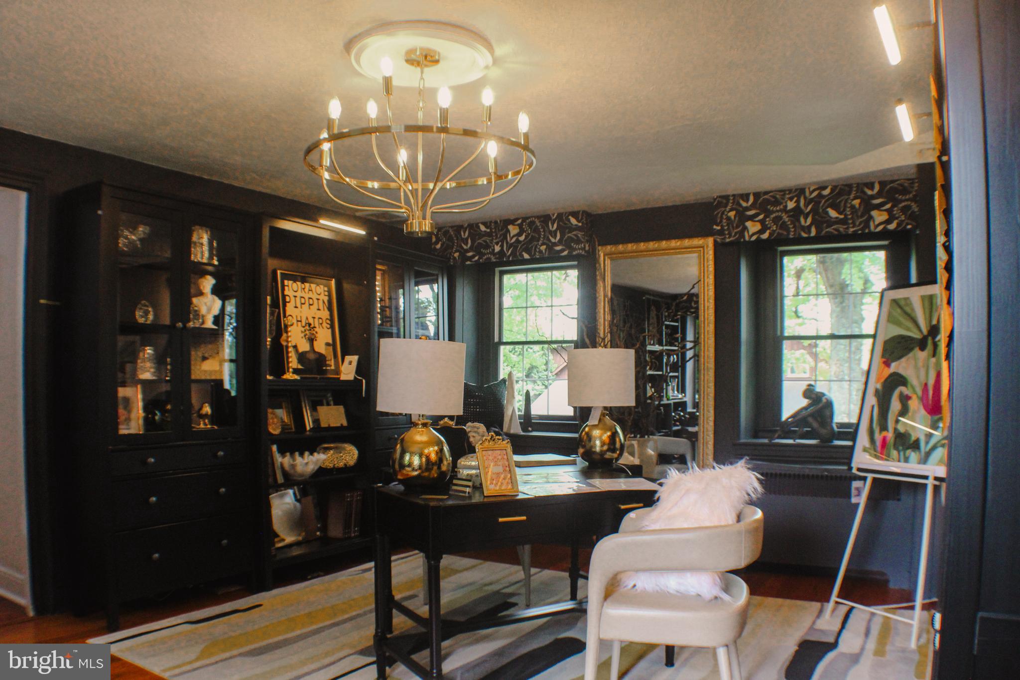636 Almshouse Road Ivyland, PA 18974 - Photo 25 of 90 a view of a dining room with furniture a chandelier and wooden floor