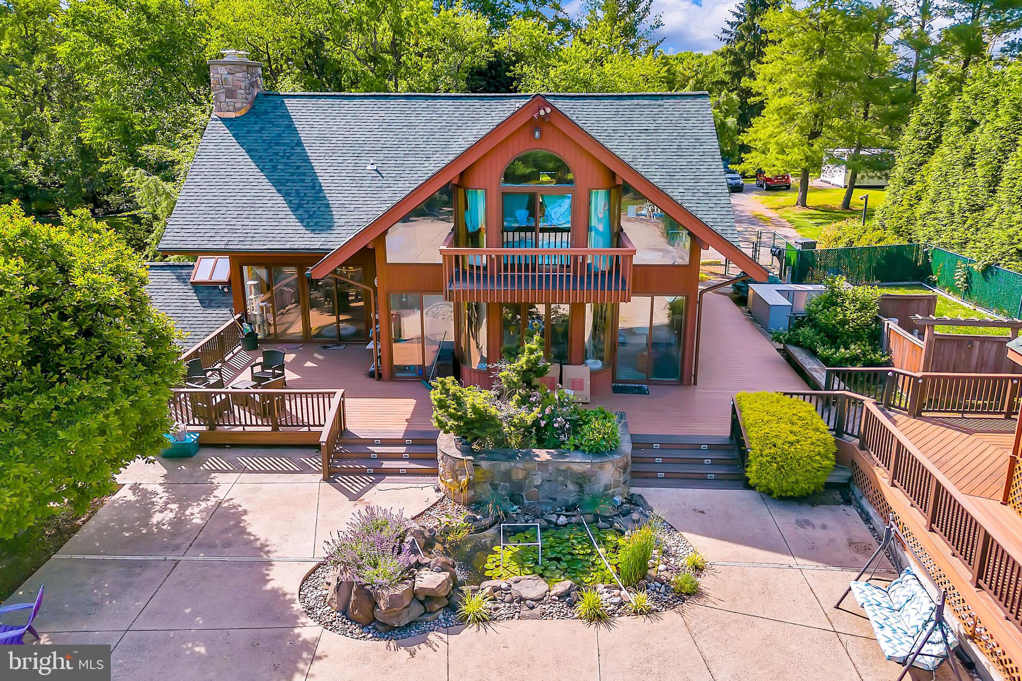 636 Almshouse Road Ivyland, PA 18974 - Photo 28 of 90 a front view of a house with a garden