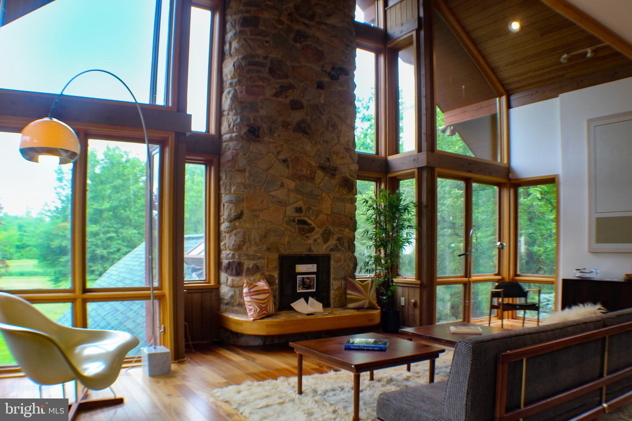 636 Almshouse Road Ivyland, PA 18974 - Photo 36 of 90 a living room with furniture and a fireplace