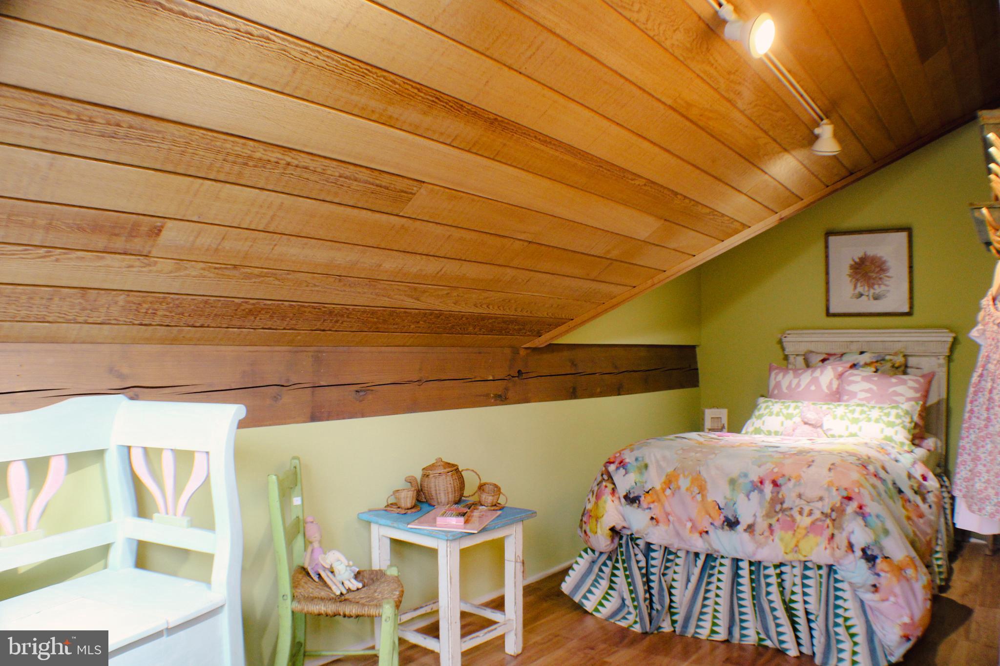 636 Almshouse Road Ivyland, PA 18974 - Photo 44 of 90 a bedroom with two beds and a chair