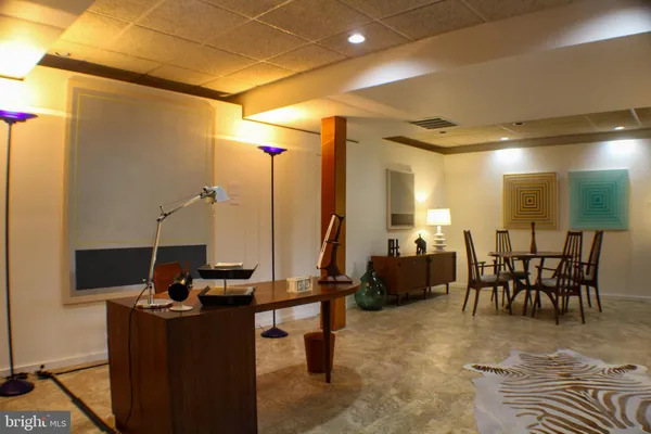 an aerial view of a house with garden space and street view