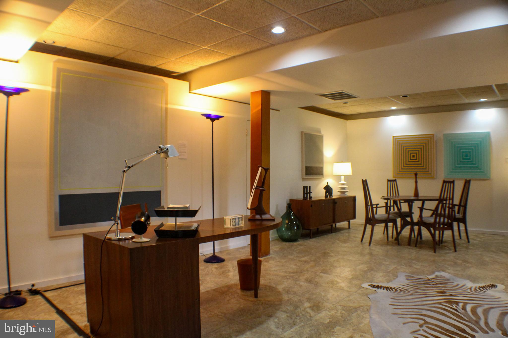 636 Almshouse Road Ivyland, PA 18974 - Photo 45 of 90 a room with lots of chairs and mirrors