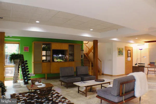 an aerial view of house with swimming pool and outdoor space