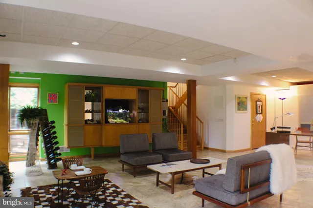 an aerial view of house with swimming pool and outdoor space