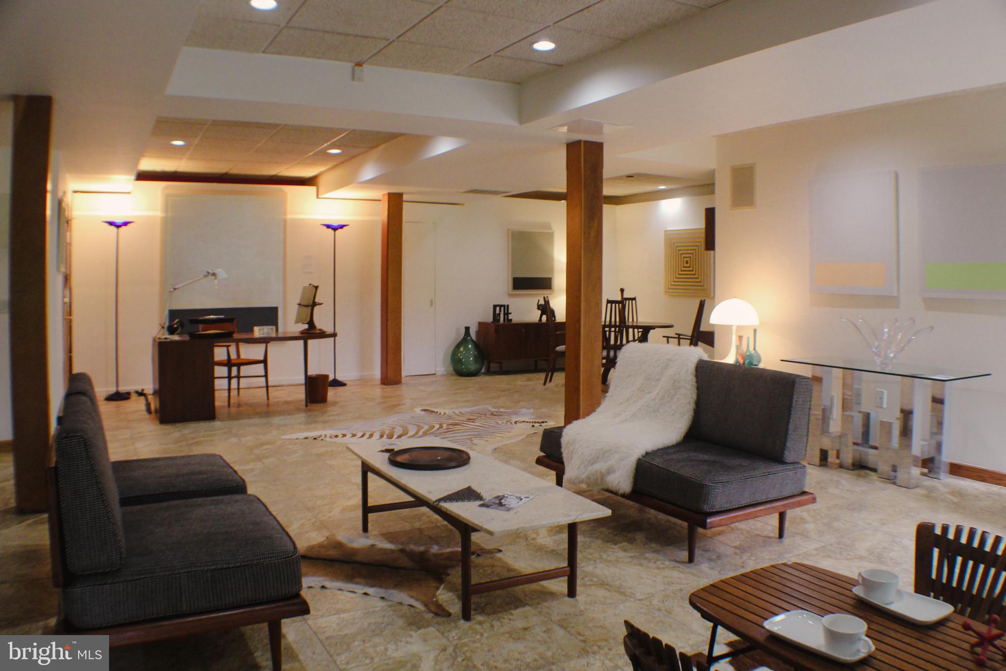 636 Almshouse Road Ivyland, PA 18974 - Photo 48 of 90 a living room with furniture and wooden floor