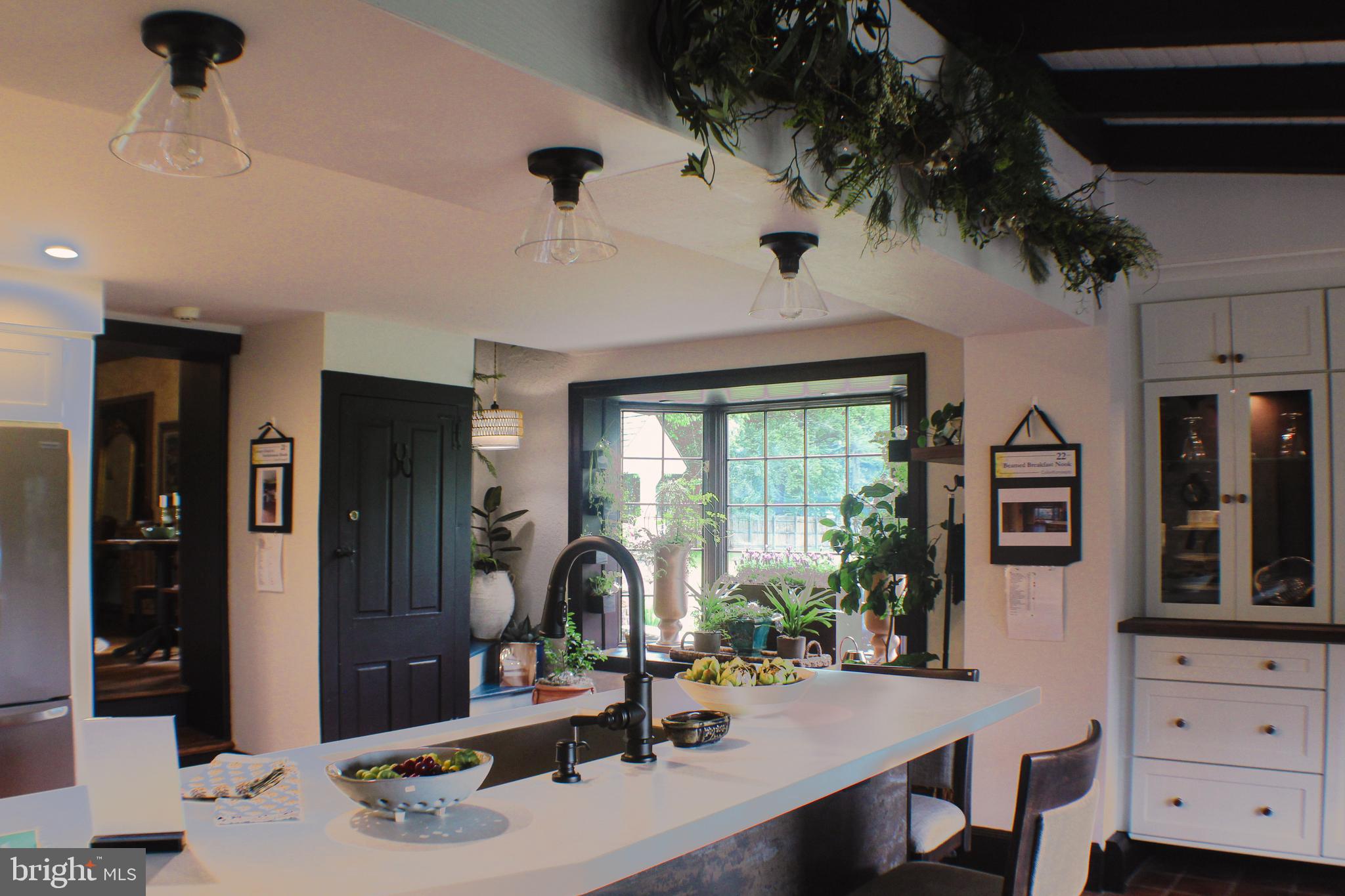 636 Almshouse Road Ivyland, PA 18974 - Photo 6 of 90 a view of a workspace with furniture and a large window