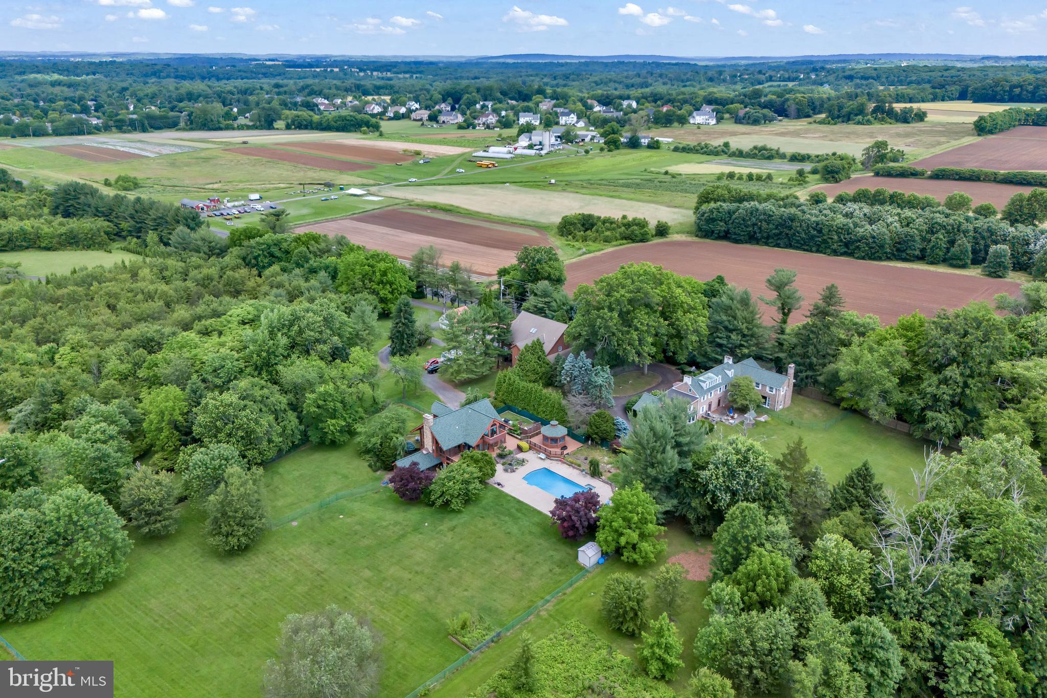636 Almshouse Road Ivyland, PA 18974 - Photo 86 of 90 a view of a lush green outdoor space with a lake view and mountain view