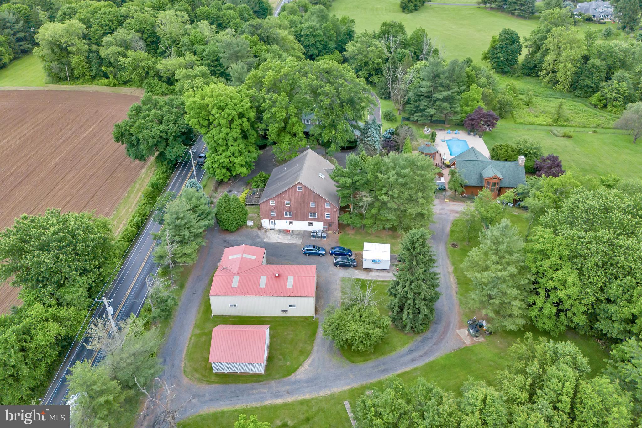 636 Almshouse Road Ivyland, PA 18974 - Photo 89 of 90 an aerial view of residential house with outdoor space and trees all around