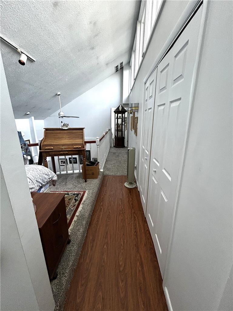 1214 Stanford Road Bethlehem, PA 18018 - Photo 40 of 63 Upstairs hallway connecting bedrooms, loft area and containing laundry closet.