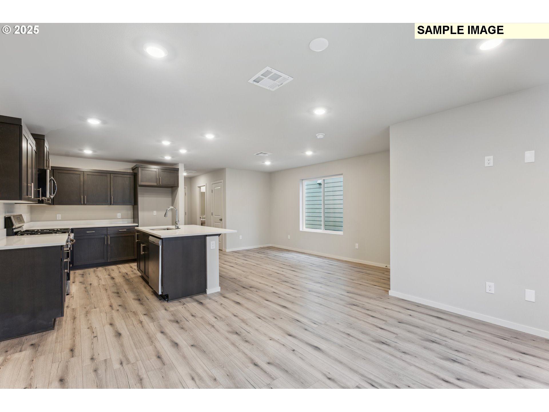 736 Merriott Lane Woodburn, OR 97071 - Photo 13 of 35 a view of kitchen with wooden floor