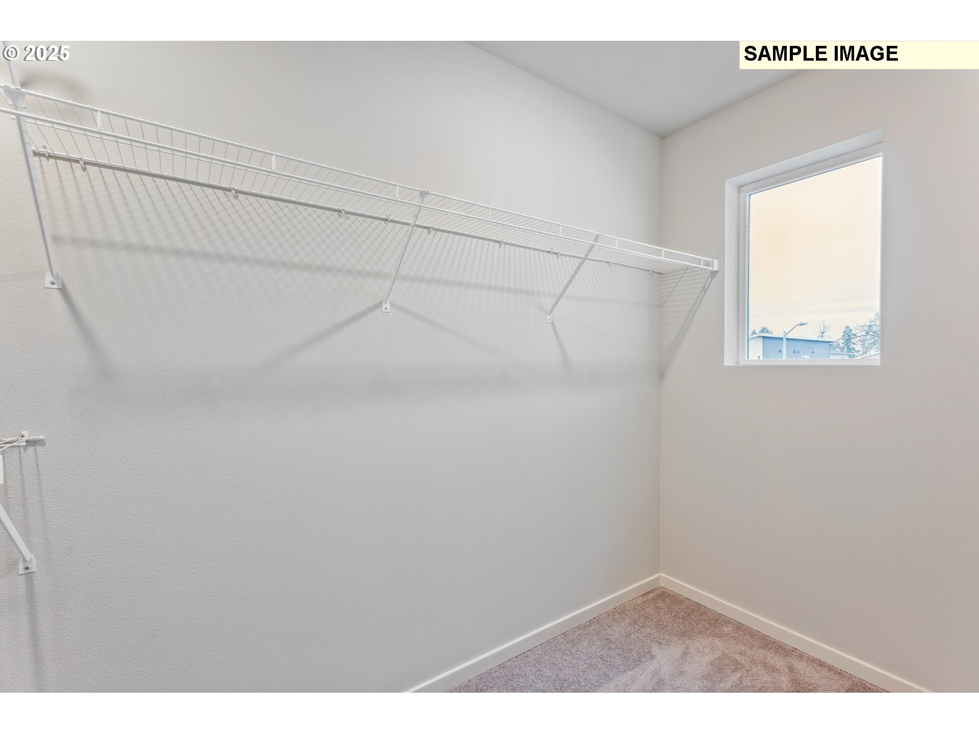 736 Merriott Lane Woodburn, OR 97071 - Photo 19 of 35 a view of a room with racks on the wall