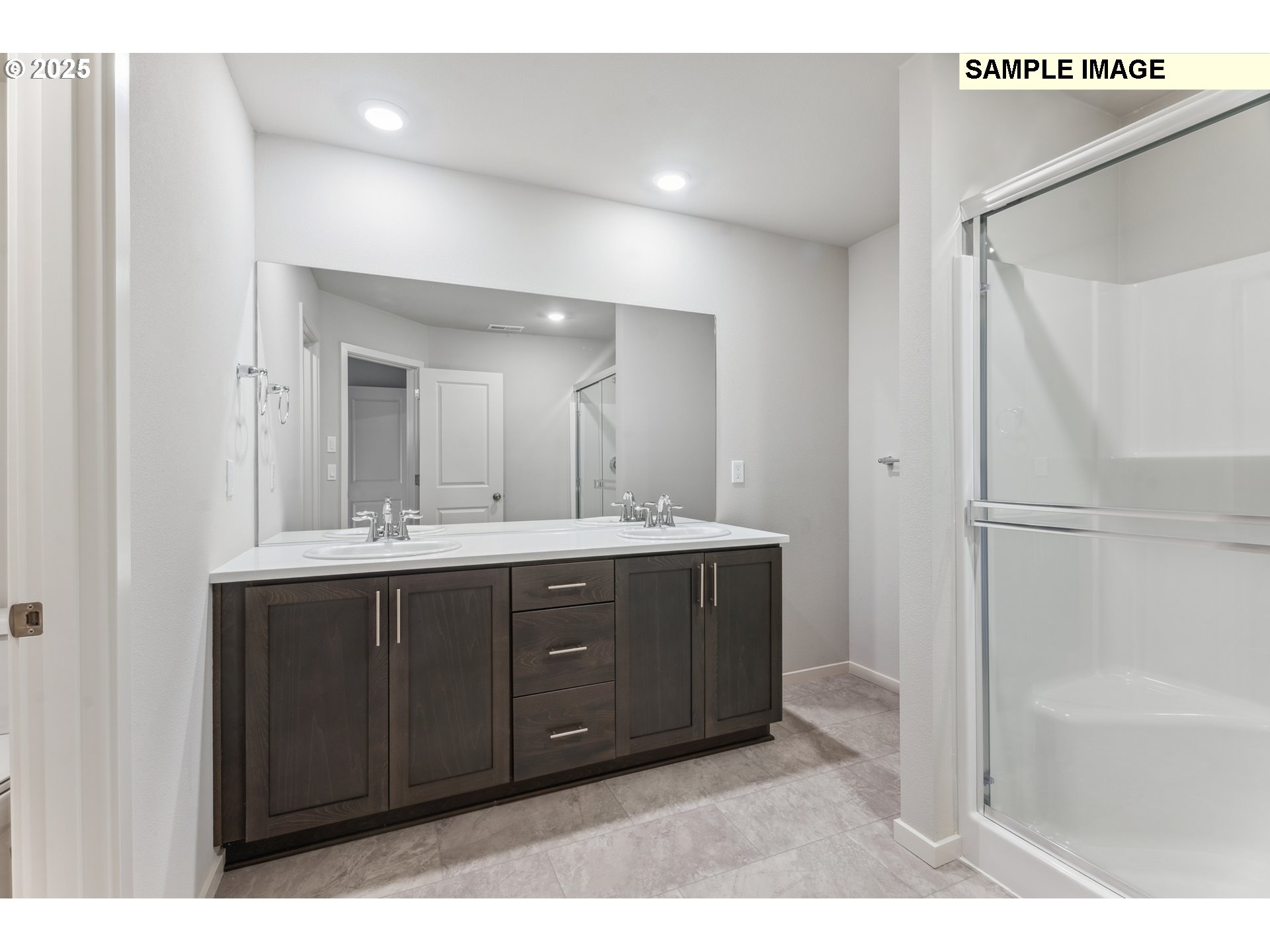 736 Merriott Lane Woodburn, OR 97071 - Photo 23 of 35 a bathroom with a sink and a mirror