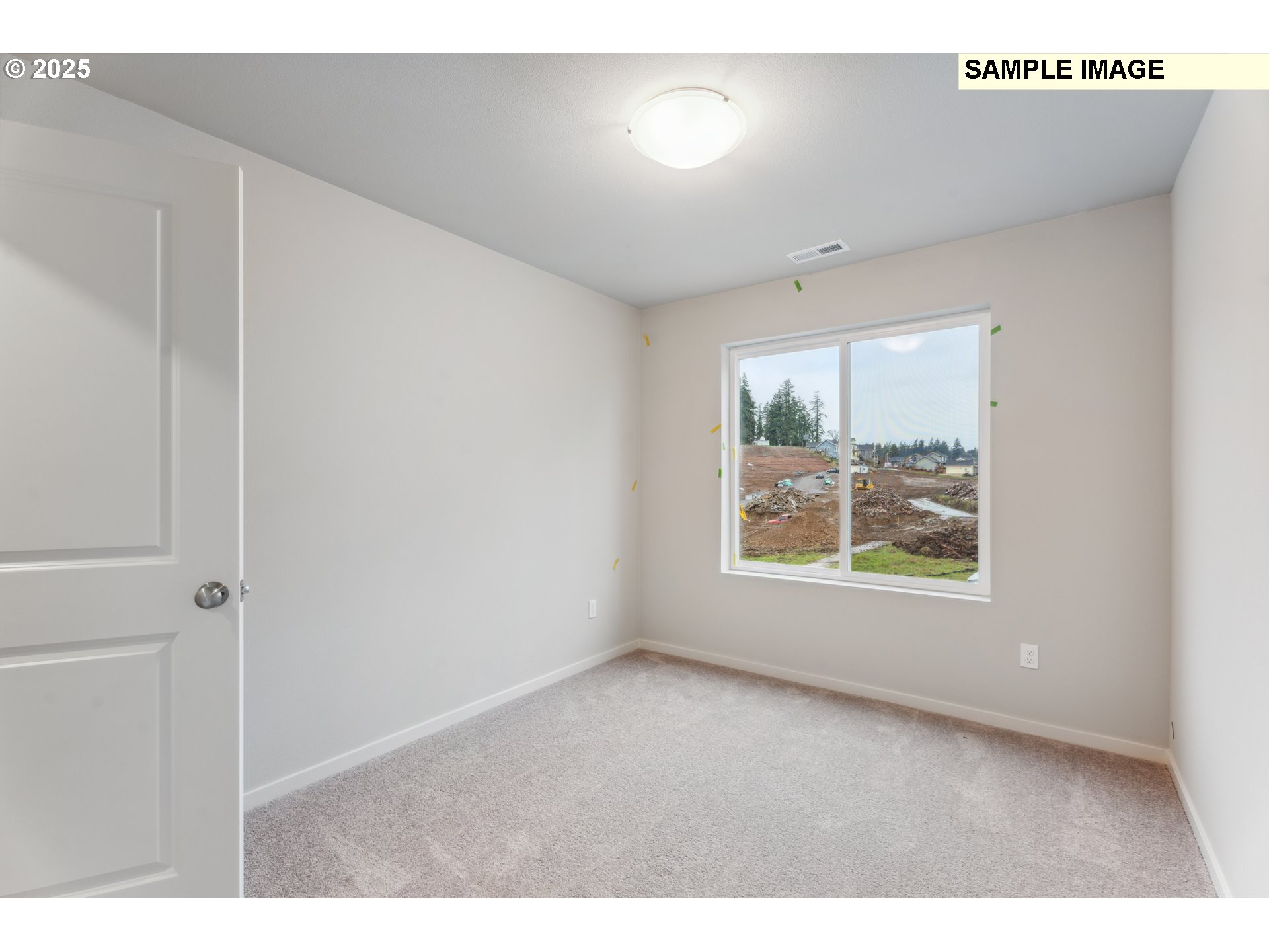 736 Merriott Lane Woodburn, OR 97071 - Photo 24 of 35 a view of an empty room with a window