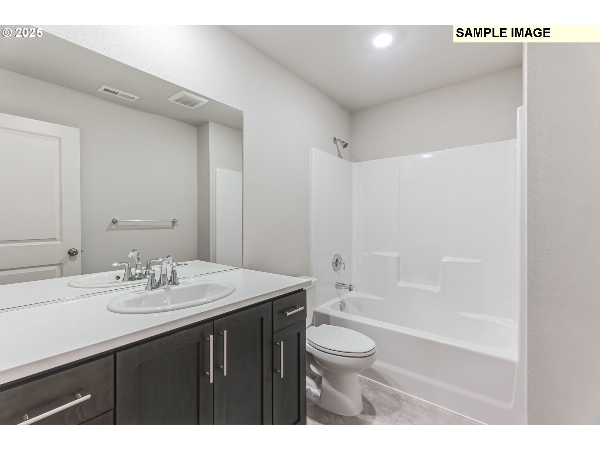 736 Merriott Lane Woodburn, OR 97071 - Photo 25 of 35 a bathroom with a sink a toilet a tub and a mirror