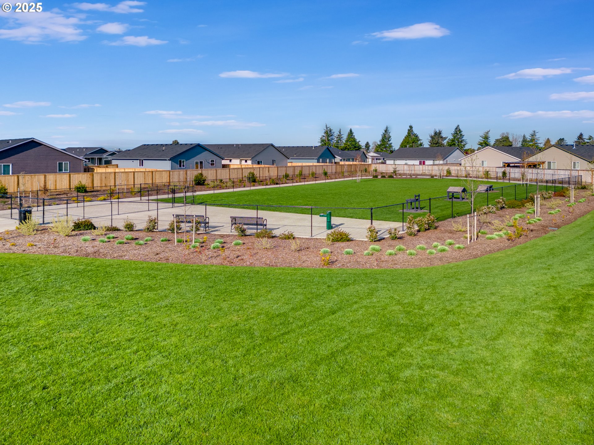 736 Merriott Lane Woodburn, OR 97071 - Photo 28 of 35 a view of an house with outdoor space and seating area