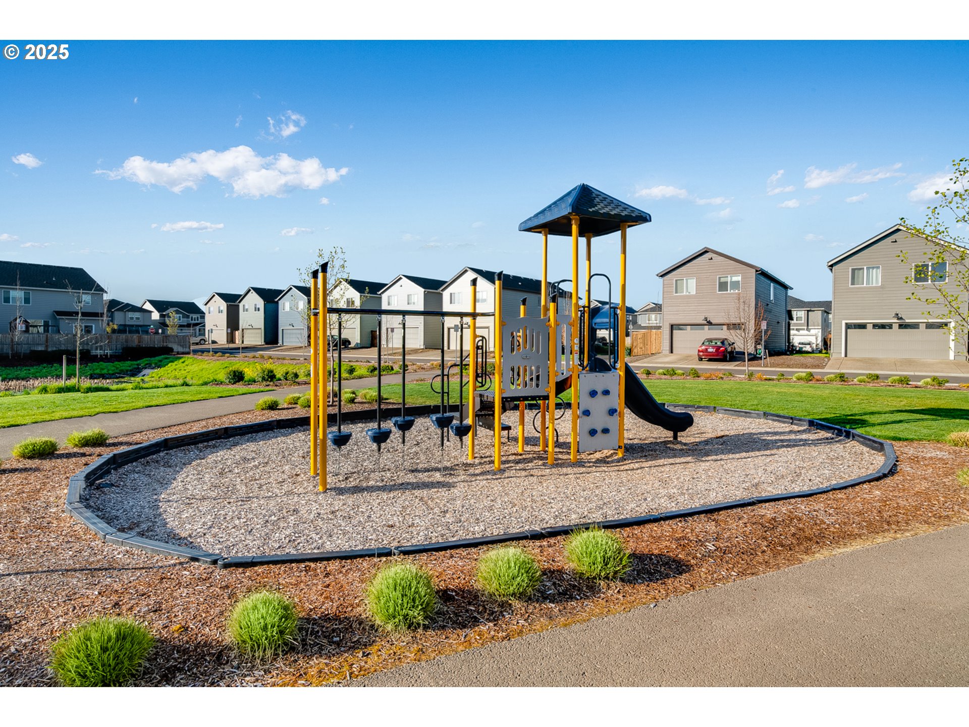 736 Merriott Lane Woodburn, OR 97071 - Photo 32 of 35 a view of a house with a yard