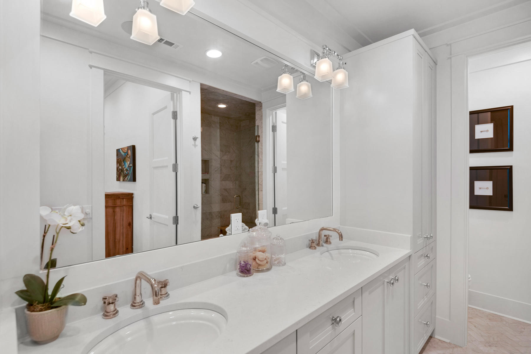 300 Pompano Street Inlet Beach, FL 32461 - Photo 22 of 43 a bathroom with a double vanity sink and a mirror