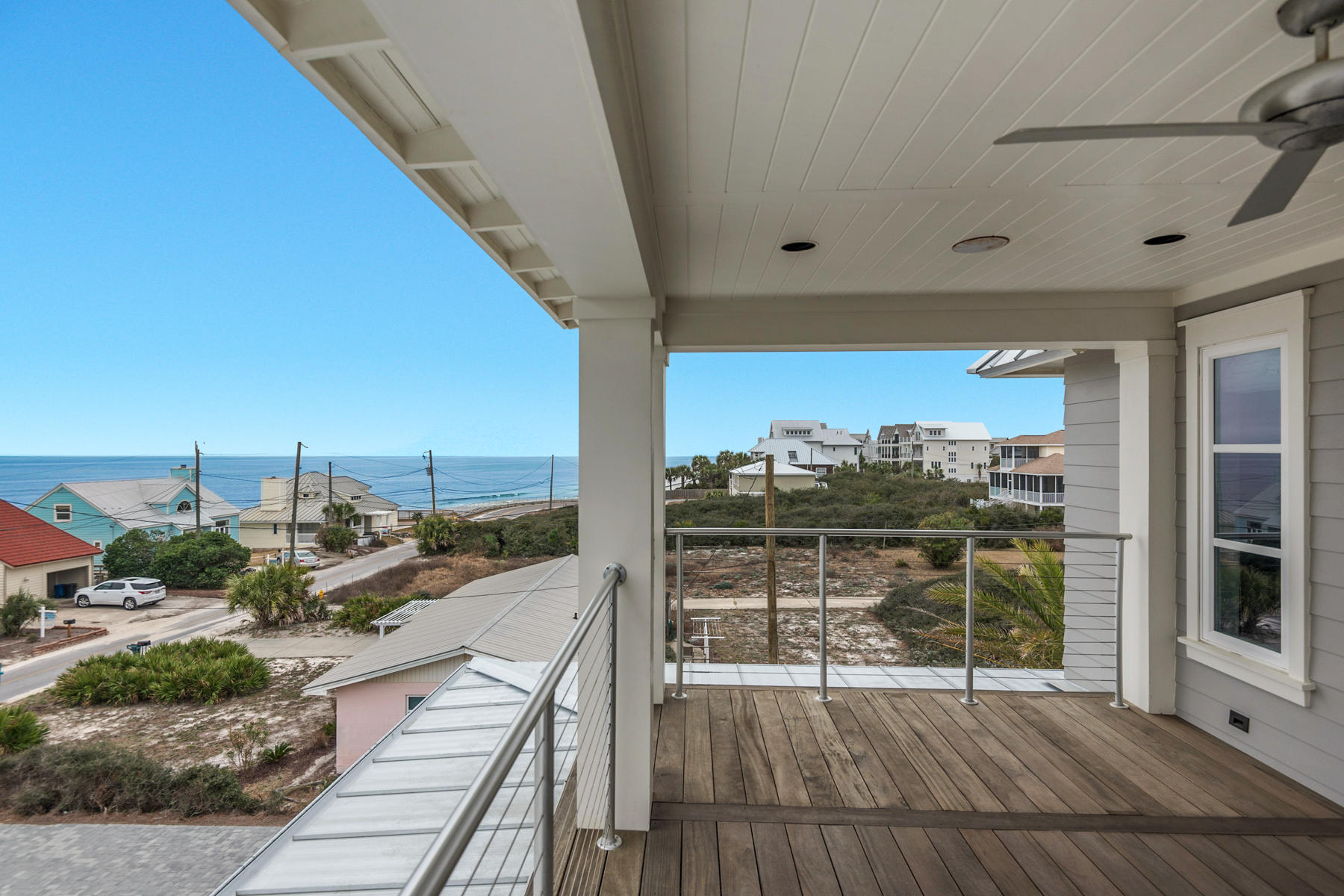 300 Pompano Street Inlet Beach, FL 32461 - Photo 37 of 43 a view of a balcony with wooden floor